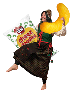 Jen holding a giant cheese puff while dressed in the traditional garb of Northern Sweden.